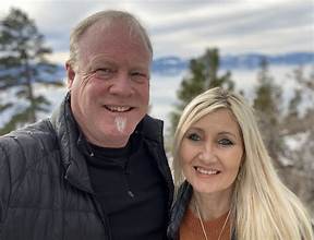 Cathy and Cory Knowland outdoors with Oregon landscape behind them